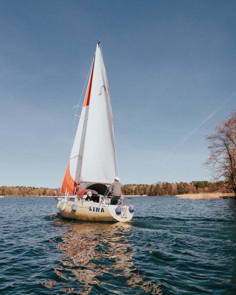Linawang26 Enjoy a peaceful sailing experience on a picturesque lake in Trakai, Lithuania.