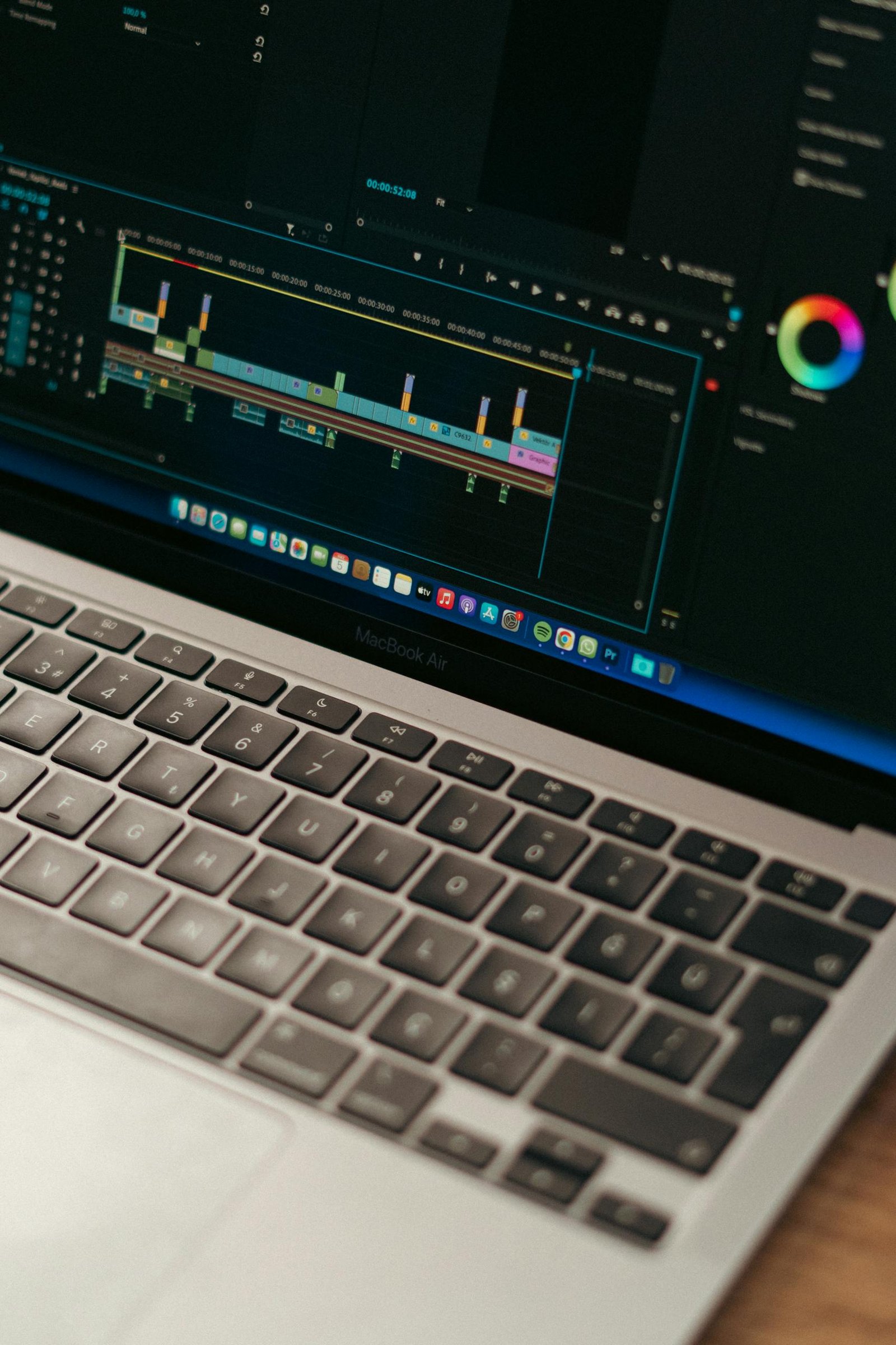 Detailed view of video editing software interface on a MacBook Air.thisvidscat.org
